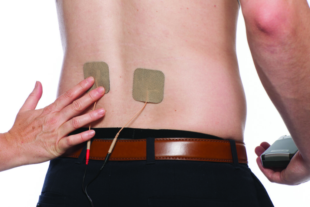 Picture 7 - photograph of pads placed on a persons back