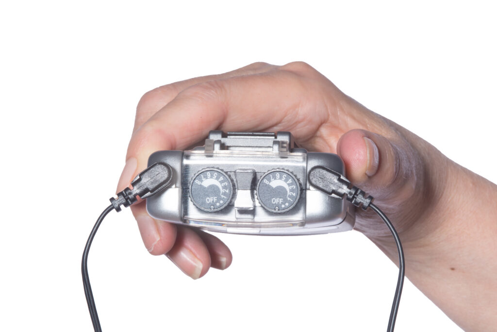 Picture 3 - photograph of a tens machine with wires attached