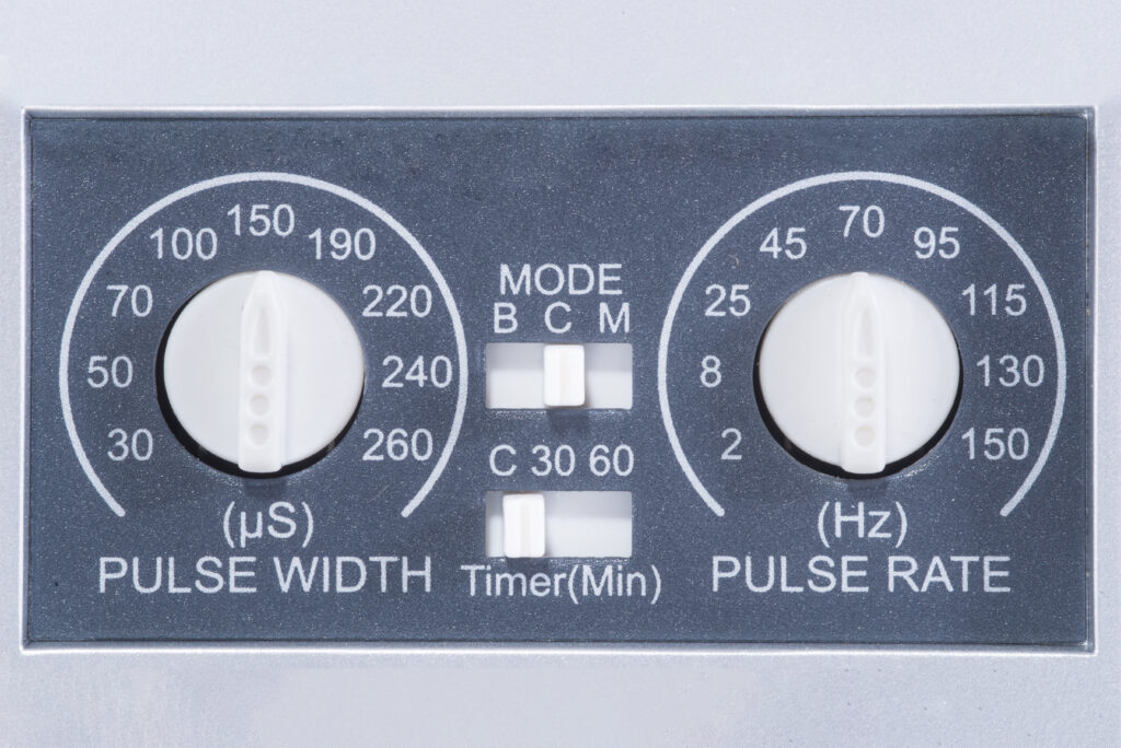 Picture 4 - Photograph of the tens machine control dials