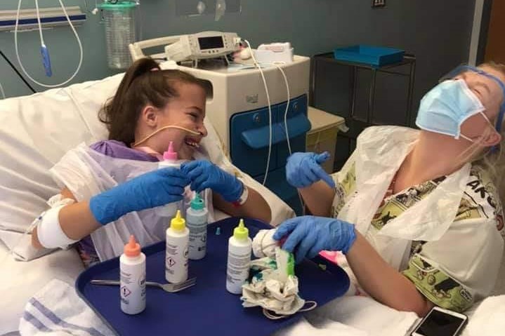 patient and nurse laughing