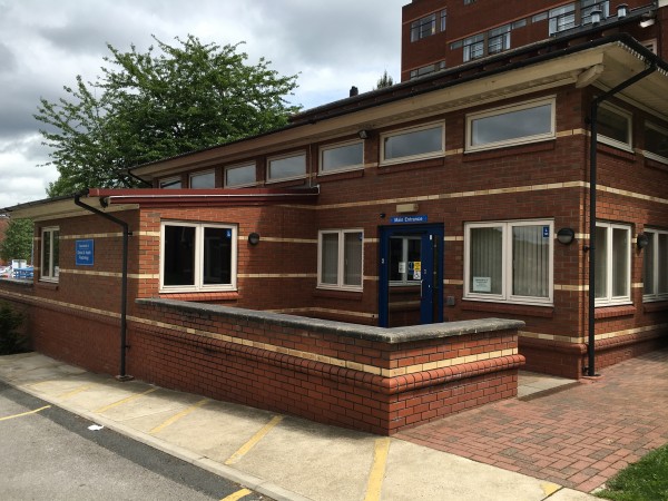 Photo of the Department of Clinical and Health Psychology building. A red-brick two-storey building at St James's Hospital.