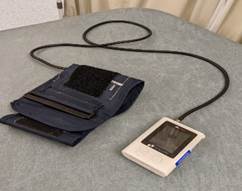 An image showing an Ambulatory Blood Pressure (BP) monitor.