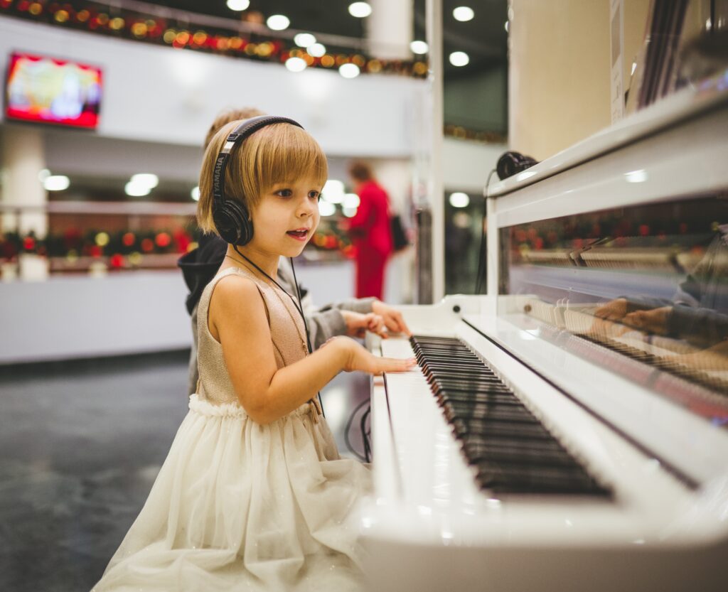 Image of child playing the piano