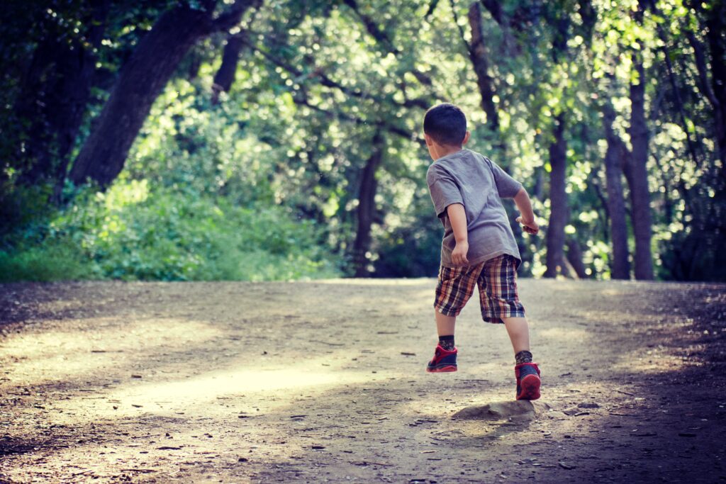 Image of child walking outside