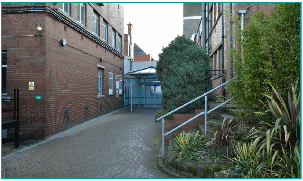 An image of the entrance to the main hospital building.