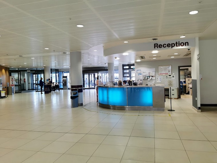 An image of the reception and the exit on your right.