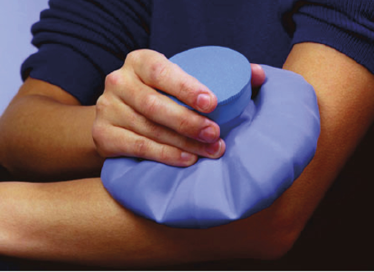 Photograph of an ice pack being applied to a bruise on the arm