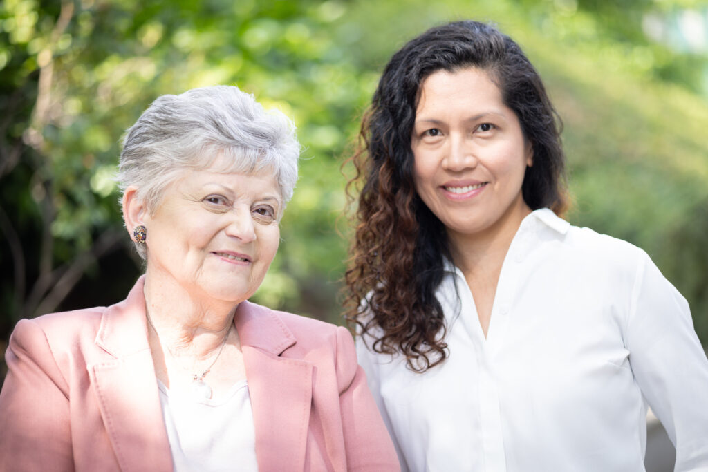 A photo of Sue Lees on the left with Senior Research Nurse, Daffodil Pastor on the right.