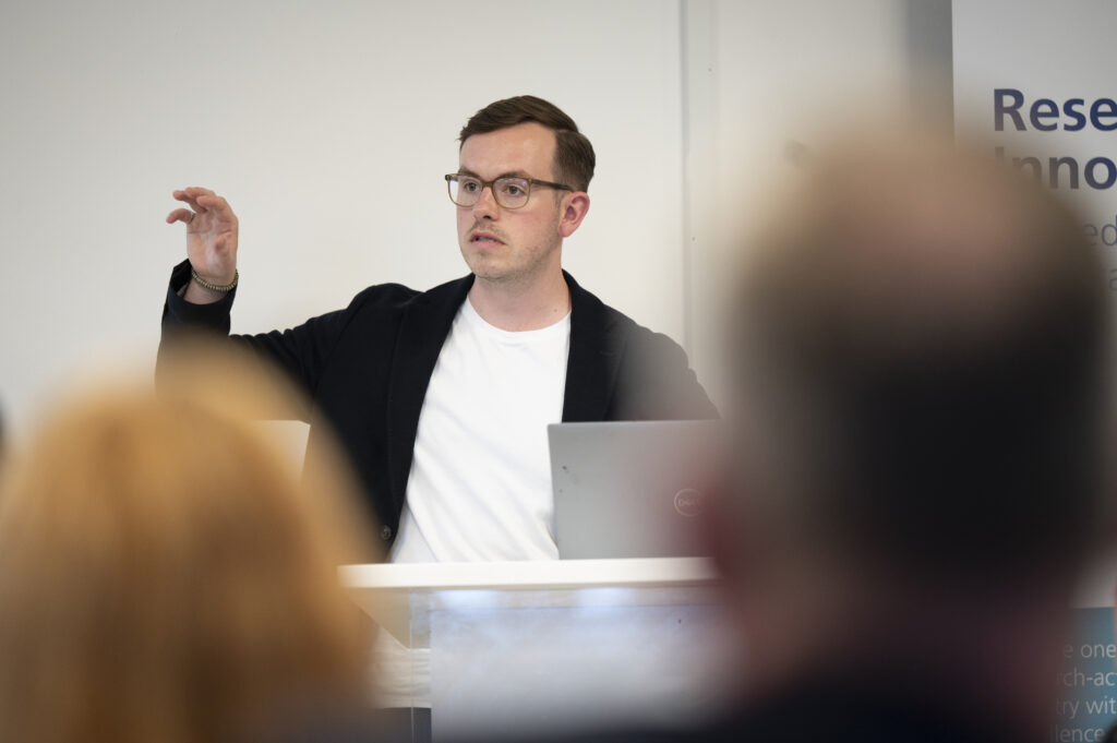 An image of Jack Porter presenting at the NIA event.