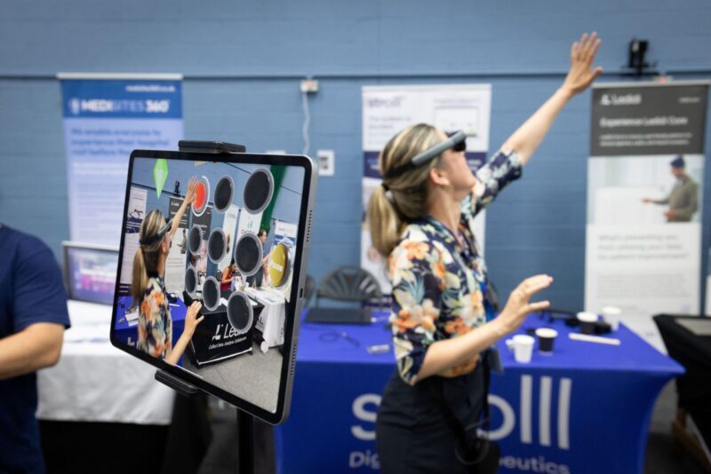 R and I Annual Conference Exhibitor Hall delegate glasses 2 small