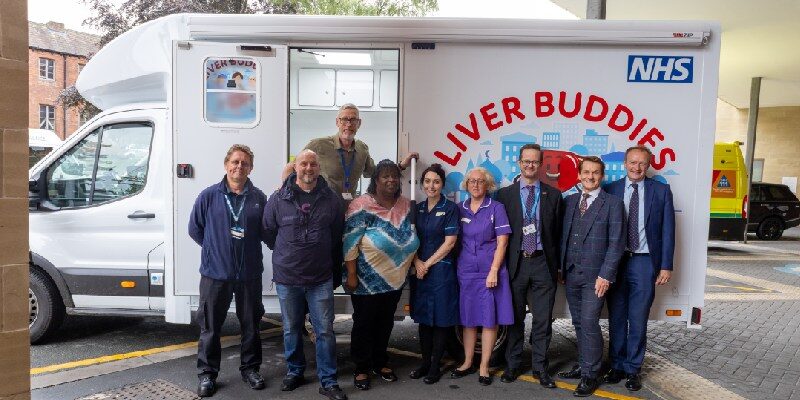 West Yorkshire Mobile Liver Clinic team in front of branded vehicle