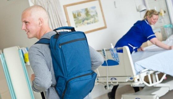 Young man with a rucksack in ambulatory care unit